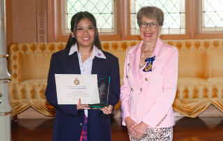 Freeman Catholic College student Erica Chau receives a 2023 Order of Australia NSW Youth Community Service Award from NSW Governor General Margarey Beazley.